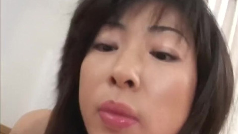 Asian milf titty fucker jerks off