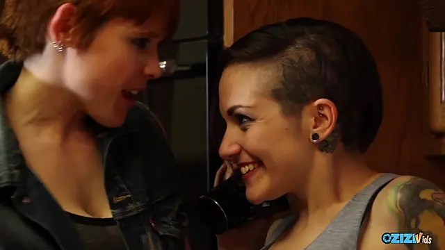 A dazzling brunette is fucked by her lesbian friend and her strapon