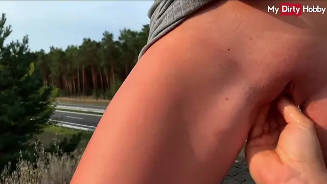 German MILF gets her tight pussy deeply fist-fucked in public